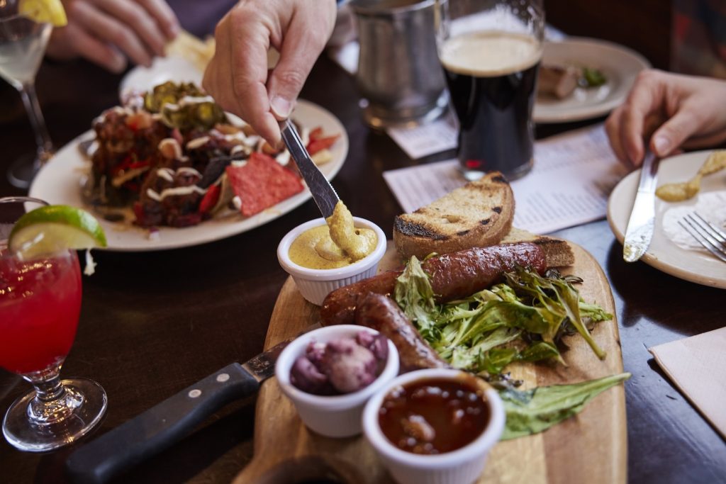 An aerial view of a charcuterie spread and nachos at Porters' Pub.
